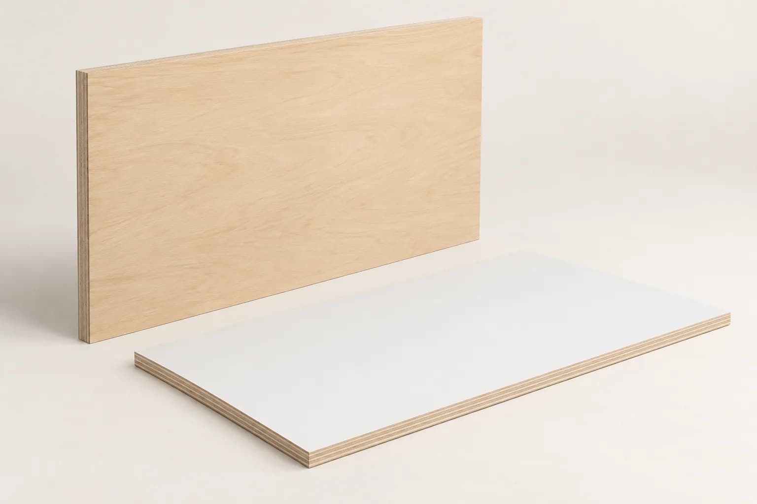 Complete plywood panels with a pale natural wood face and a white laminate face, with veneer layers visible on narrow cut edges
