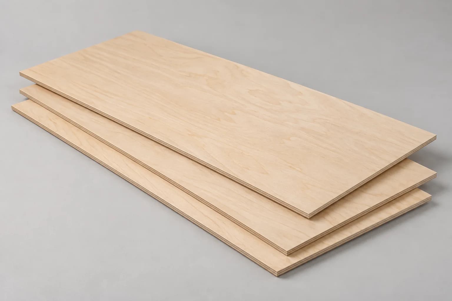 Thin flat plywood sheets with smooth natural veneer faces and narrow layered cut edges